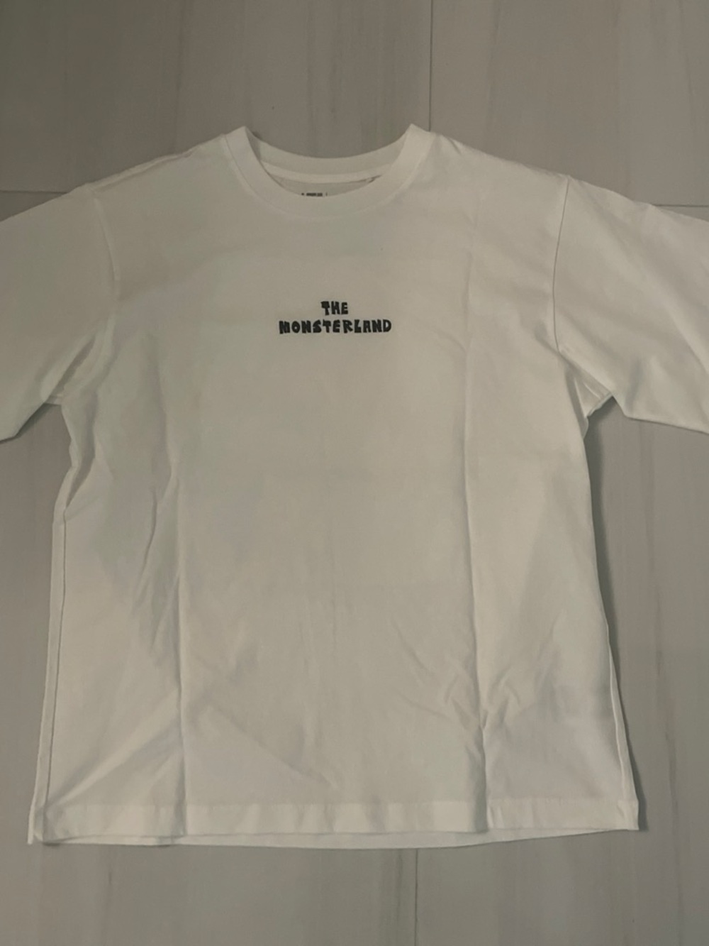 Uniqlo White Crewneck T-Shirt with Subtle Neck Print